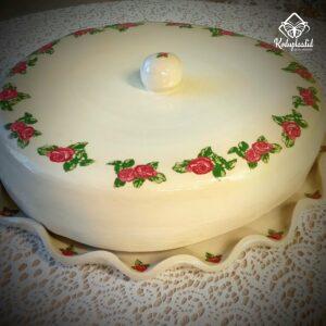 Roosidega koogi alus, kaanega